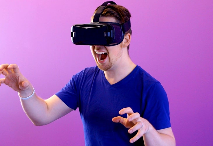 Person interacting with VR headset.